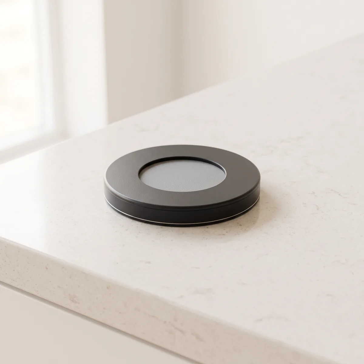 The swivel base in Graphite, a dark matte finish